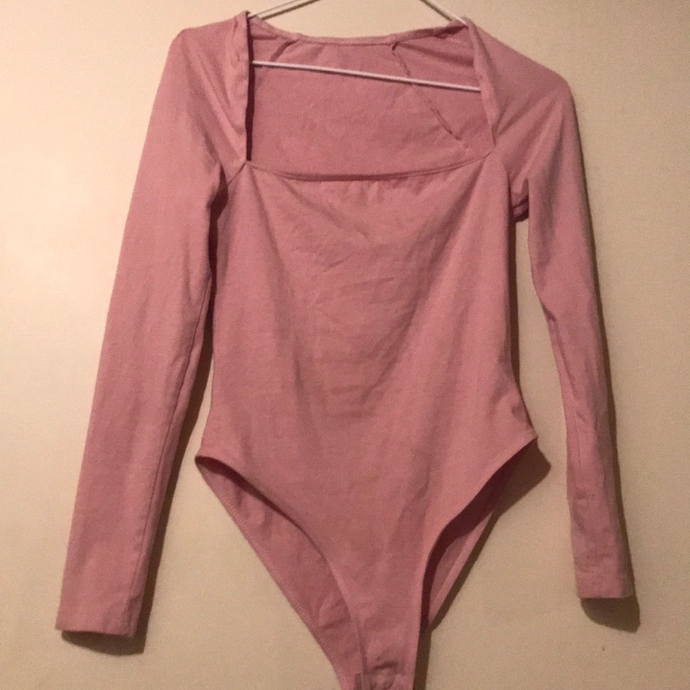 Light pink bodysuit.